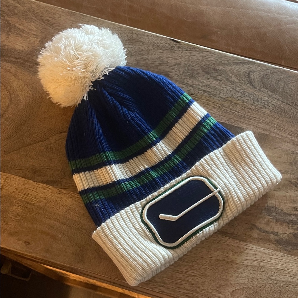Canuck Logo 40th anniversary - Navy and White Striped Pom-Pom Beanie